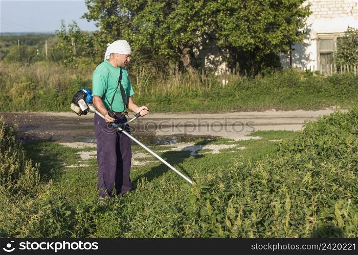 man farm sewing grass with lawn mower