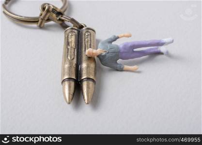 Man figurine model and Bullet as Conceptual against war photography