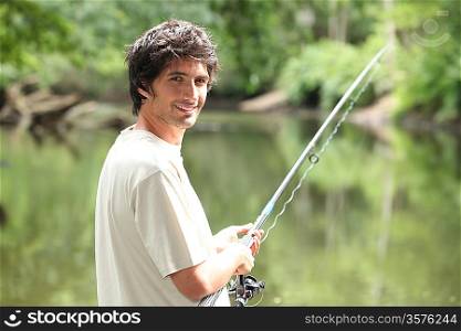 Man fishing on a river