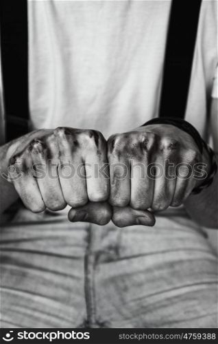 man fists with blood