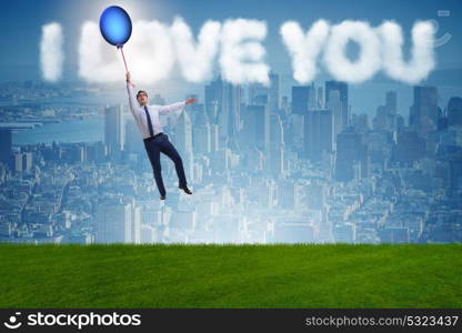 Man flying balloons in romantic concept