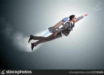 Man flying with the rocket in business concept