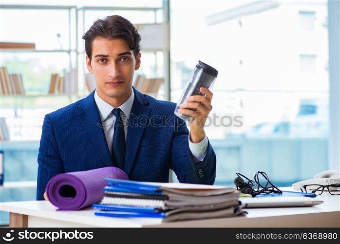 Man getting ready for sports break in the office