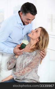 Man giving a present to woman
