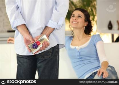 Man giving his girlfriend treat