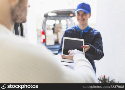 man giving online signature delivery