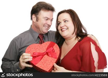 Man giving valentine candy to his lover. Isolated on white.