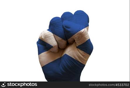 man hand fist painted country flag of scotland