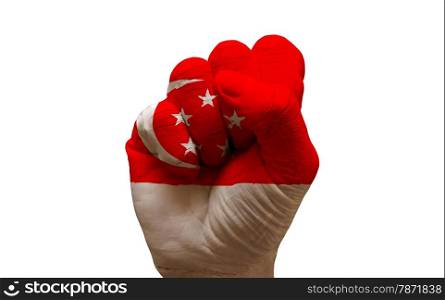 man hand fist painted country flag of singapore