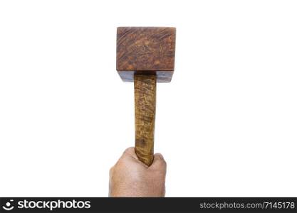 Man hand holding a mallet hammer made of burl wood tools for used by carpenter in workshop on isolated white blackground