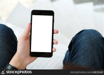 Man hand holding black smart phone with blank screen on background for mock up, template, technology and lifestyle