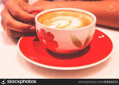 Man hand holding coffee cup. Happy morning. Refreshing lifestyle