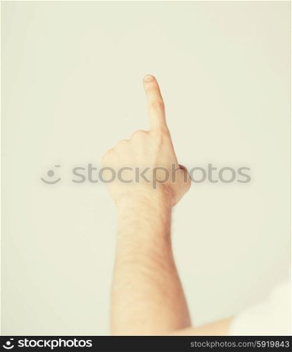 man hand pointing at something. picture of man hand pointing at something