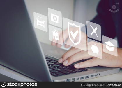 Man hand using a computer to type on a keyboard to find information on the Internet on social networks.Insurance health care investment finance and home estate icon virtual business concept.