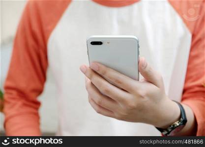 Man hand using black smart phone, people on phone, technology and lifestyle