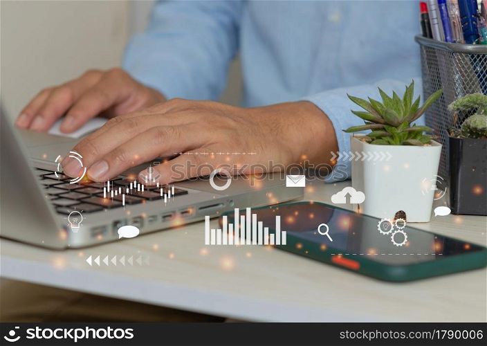 man hand using laptop to working social media marketing icon internet network technology and business concept