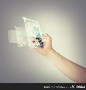 man hand with smartphone and virtual screen. close up of man hand with smartphone and virtual screen