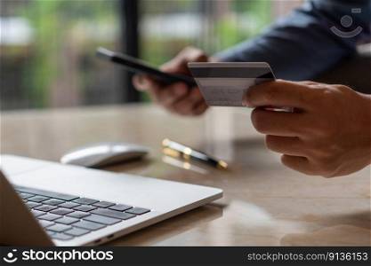 man hands holding credit card using internet payment laptop computer, online shopping digital banking, Business financial technology concept.