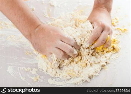 man hands kneading a dough