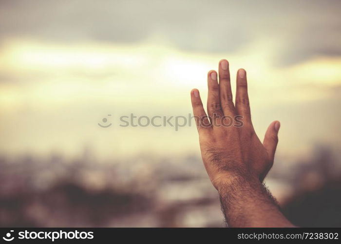 Man hands praying for blessing from god