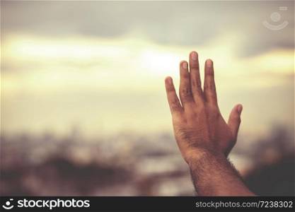 Man hands praying for blessing from god