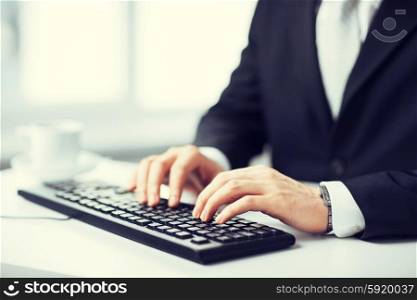 man hands typing on keyboard. picture of man hands typing on keyboard