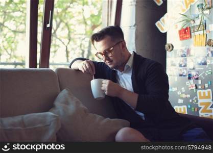 Man have coffee break in startup office