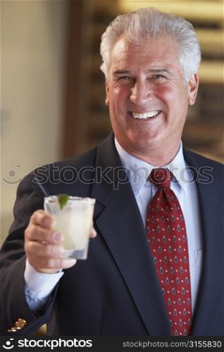 Man Having A Drink At A Bar