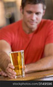 Man having a glass of beer