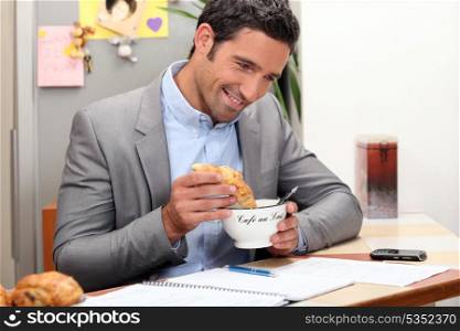 Man having breakfast at home