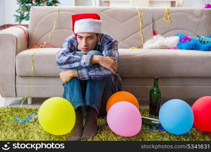 Man having hangover after christmas party