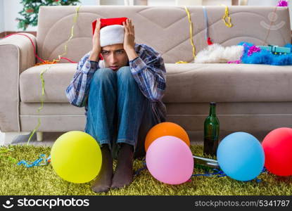 Man having hangover after christmas party