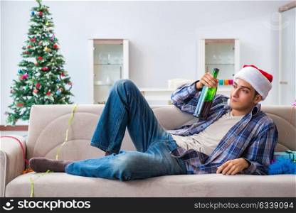Man having hangover after christmas party