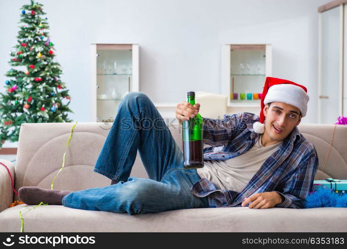 Man having hangover after christmas party