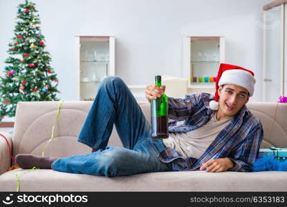 Man having hangover after christmas party