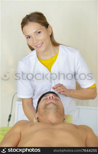 man having head massage close up