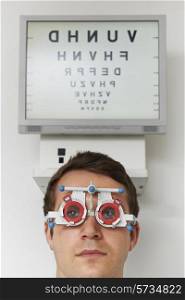 Man Having Sight Test At Optometrist