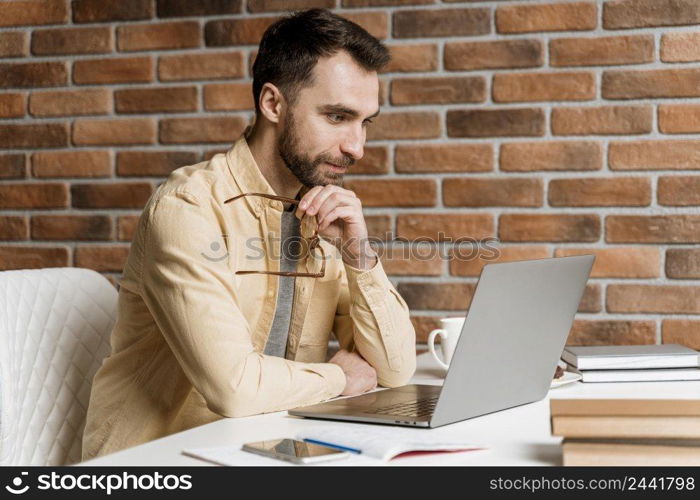 man having video call laptop 2