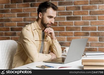 man having video call laptop 2