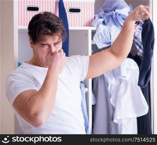 Man helpless with dirty clothing after separating from wife. The man helpless with dirty clothing after separating from wife