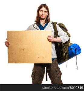 Man hiker backpacker with blank wood copy space ad. Man tourist backpacker holding blank wood banner copy space. Guy hiker backpacking.