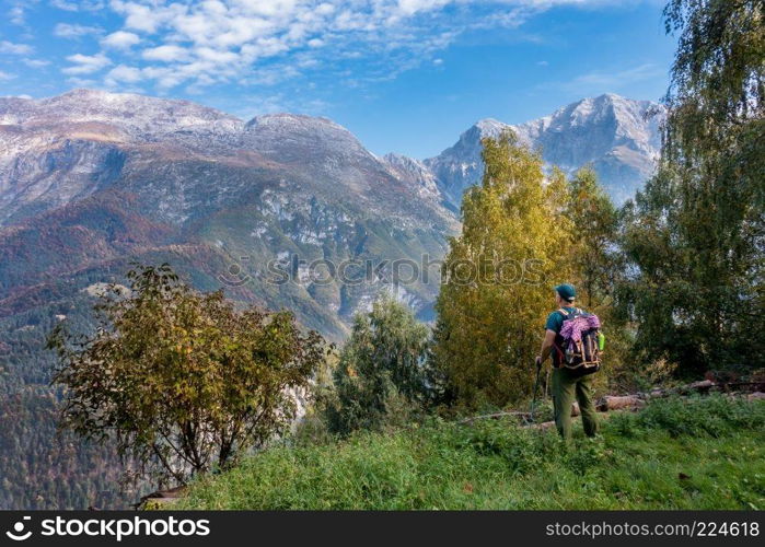 Man hiker watch the landscape of  mountain in autumn