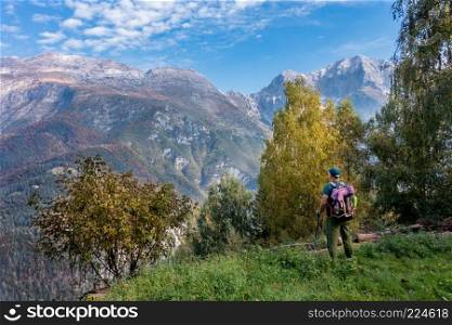 Man hiker watch the landscape of  mountain in autumn