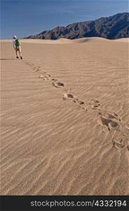 Man hiking in Death Valley National Park, California, USA