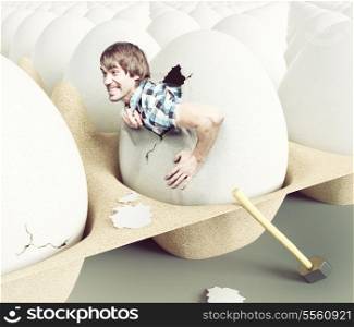 Man hit shell, getting out of eggs. Creative concept