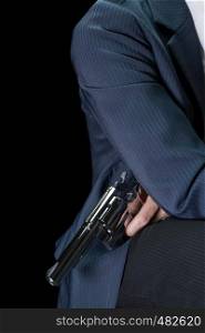 Man Hold Stainless Gun or Shooter in Hand Side Body Shoot Below in Book Cover Style. Fake Stainless Gun or Shooter in Hand portrait view for criminal or violence concept