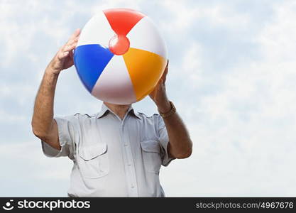 Man holding a beachball