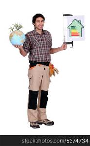 Man holding a globe and a sign for energy consumption