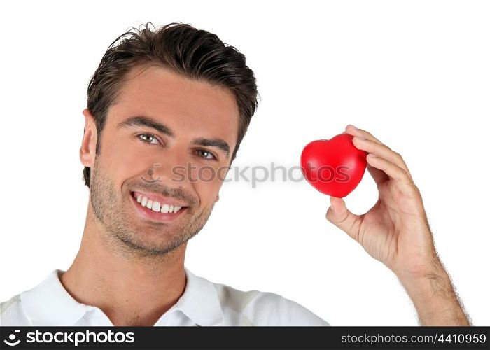 man holding a little heart