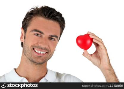 man holding a little heart